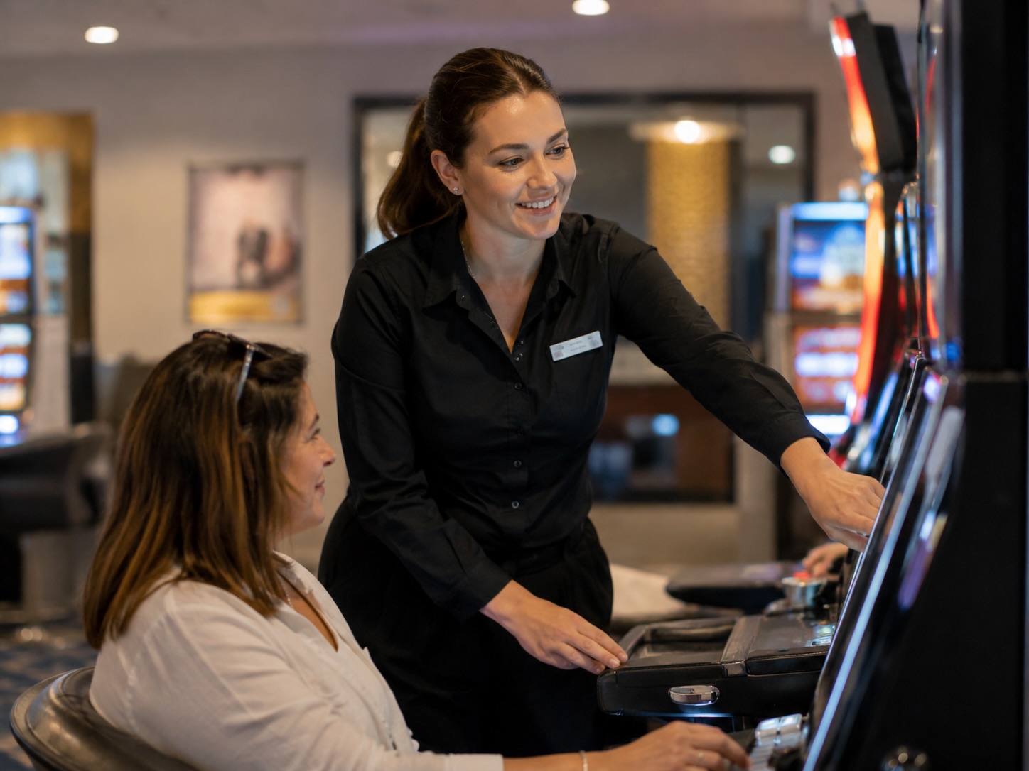 Club Gaming Attendant Assisting at a Machine
