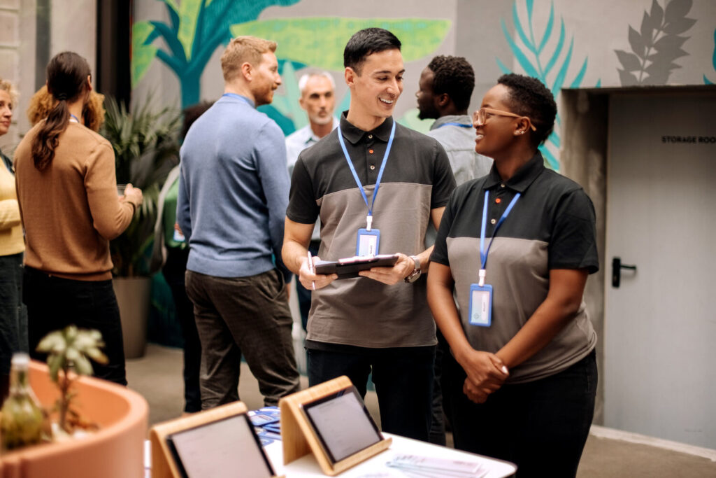 Event-Staff-Checking-In-Attendees-at-a-Corporate-Function