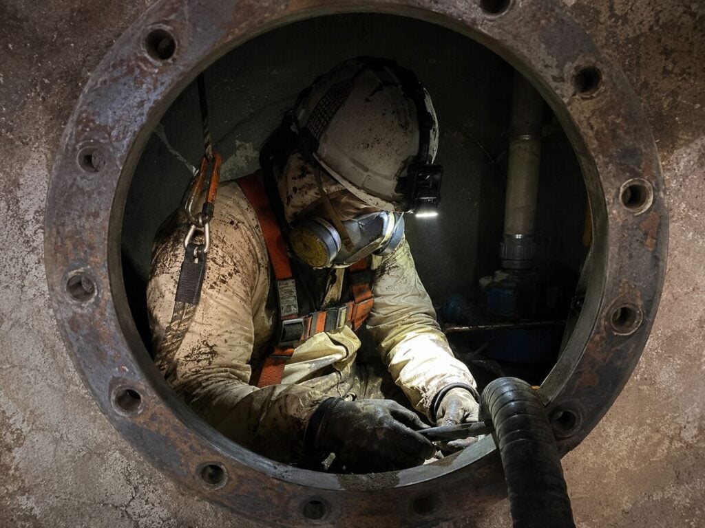 man working in a confined space
