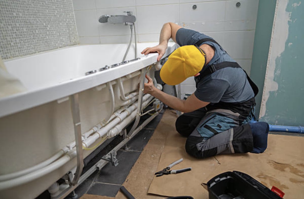 plumber at work in Australia